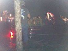 cant really tell, but I was in a lake trying to save a P.O.S Ford, i was trying to pushem out and crumbled his tail gate... and jammed his driver door, you can see my headlights