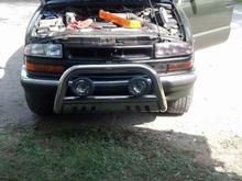 The headlight on the right of this picture is tinted but it's hard to tell with light shinning directly on it. After the grill is painted.