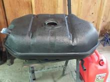 gas tank covered in undercoating