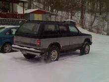 Pic 1 in the snowy driveway, other vehicle is moms Focus.