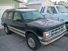 Over All side pic. The paint is faded. The person I purchased it from said they tried to wax it. I had this same problem on the 83 blazer I had. A little rubbing compound fixed that. As a freind said. Be carefull with rubbing compound. Takes the paint right off. But it got my 83 blazer looking brand new.