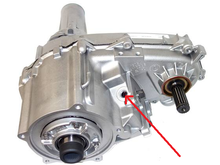 NP233 transfer case. Arrow shows where vacuum switch would be installed. (https://shop.powertrainproducts.net/product/tc108-3/)