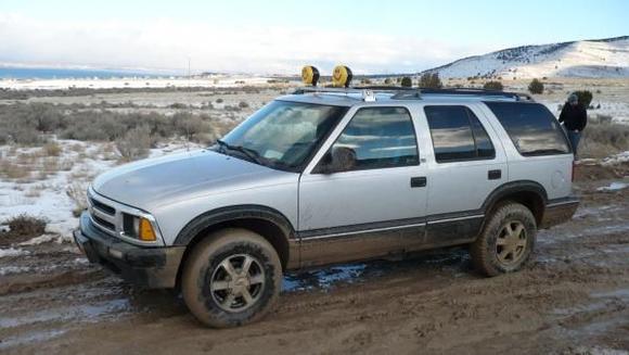 Out playin in the mud, definitley need some bigger tires though. It's just too clean.