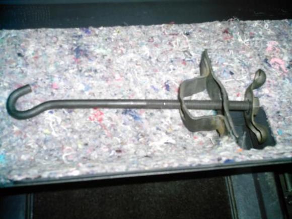 This is the hold-down removed from the hook...