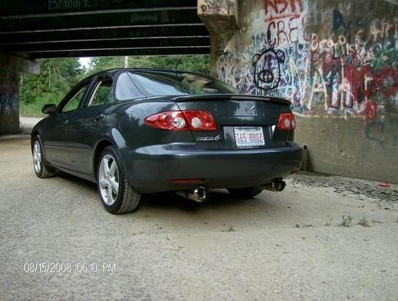 2005 Mazda 6 custom race exhaust, chrome diamond plate floor mats with chrome grenade shifter knob