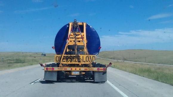 Moving windmill towers through Kansas going to Ohio or Michigan.  Started in Colorado.