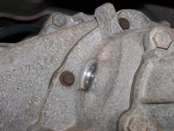 Location: Rear of the Trany top of the transfer case. Size 18mm deep socket or box wrench.