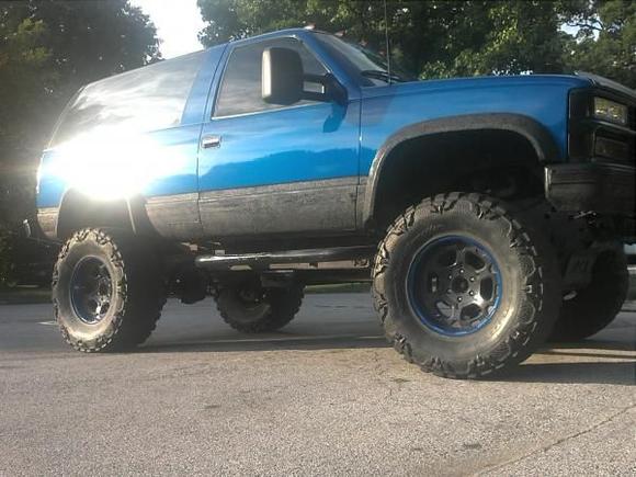 Just got finished with the paint. And new wheels.