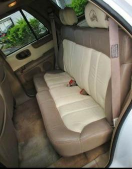 Rear seat. Looks to me like someone used leather dye spray to regenerate all the seats original look. They did pretty good too,just a few spots where it didn't set proper and didn't take good hold came free. Totally exceptable to me for what it is.