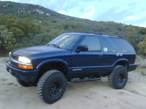 1st Modifications!

New tires/rims, 6" lift.