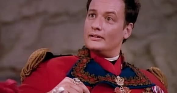 Q is a fictional character, as well as the name of a race in Star Trek appearing in the Next Generation, Deep Space Nine, Voyager, and Lower Decks series and in related media. The most familiar Q is portrayed by John de Lancie.