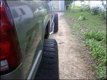 5 inches past the fenders