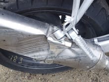 bent foot peg and bashed muffler