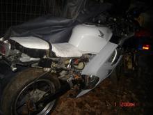 picture with white sued seat on bike.doesnt look as good as the leather one.