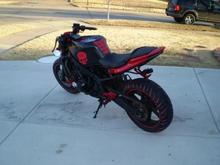 Spiked Bar Ends
Bar End Mirror
Tank Mounted Digital Speedo/GPS
Dented In Stunt Tank