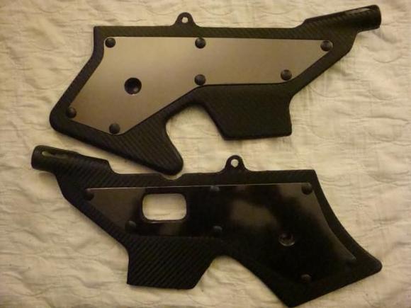 Carbon fiber and Black Chrome... added two more rivets in the middle