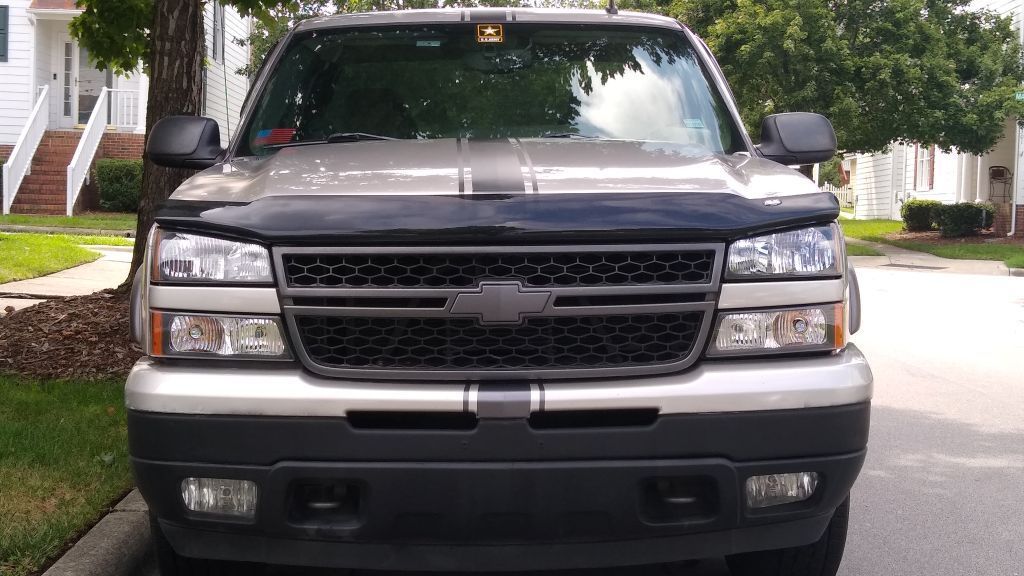 My grill looked beat up on the chrome part so I removed it and painted it as part of an dress up project I did.