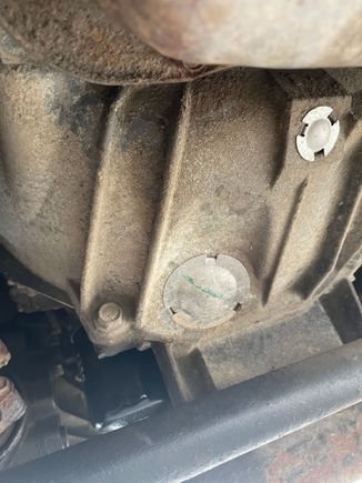 Are we talking about those round silver pieces, I’m assuming the larger one..? And is that a cover for the plug, or is it the actual plug itself?