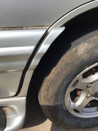 I am looking for this piece that is by the back door/wheel