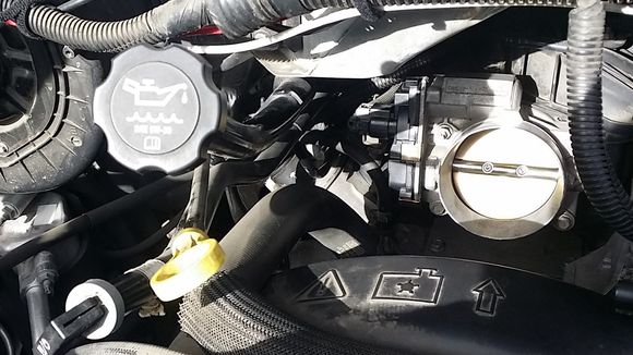 I found that it helped to remove the hose/cable management bracket for access to the back of the tps. 