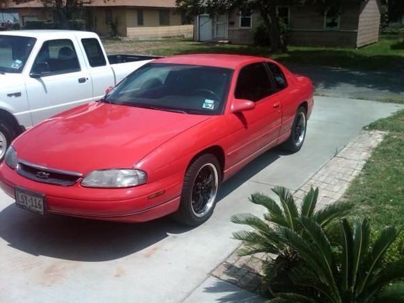 99 montecarlo, many mods, more on the way, getting the paint issues fixed on it soon, and maybe a rebuild, maybe, maybe do a total tear down and add a V8 and a t-56?