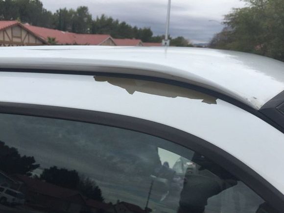 Passenger door top.