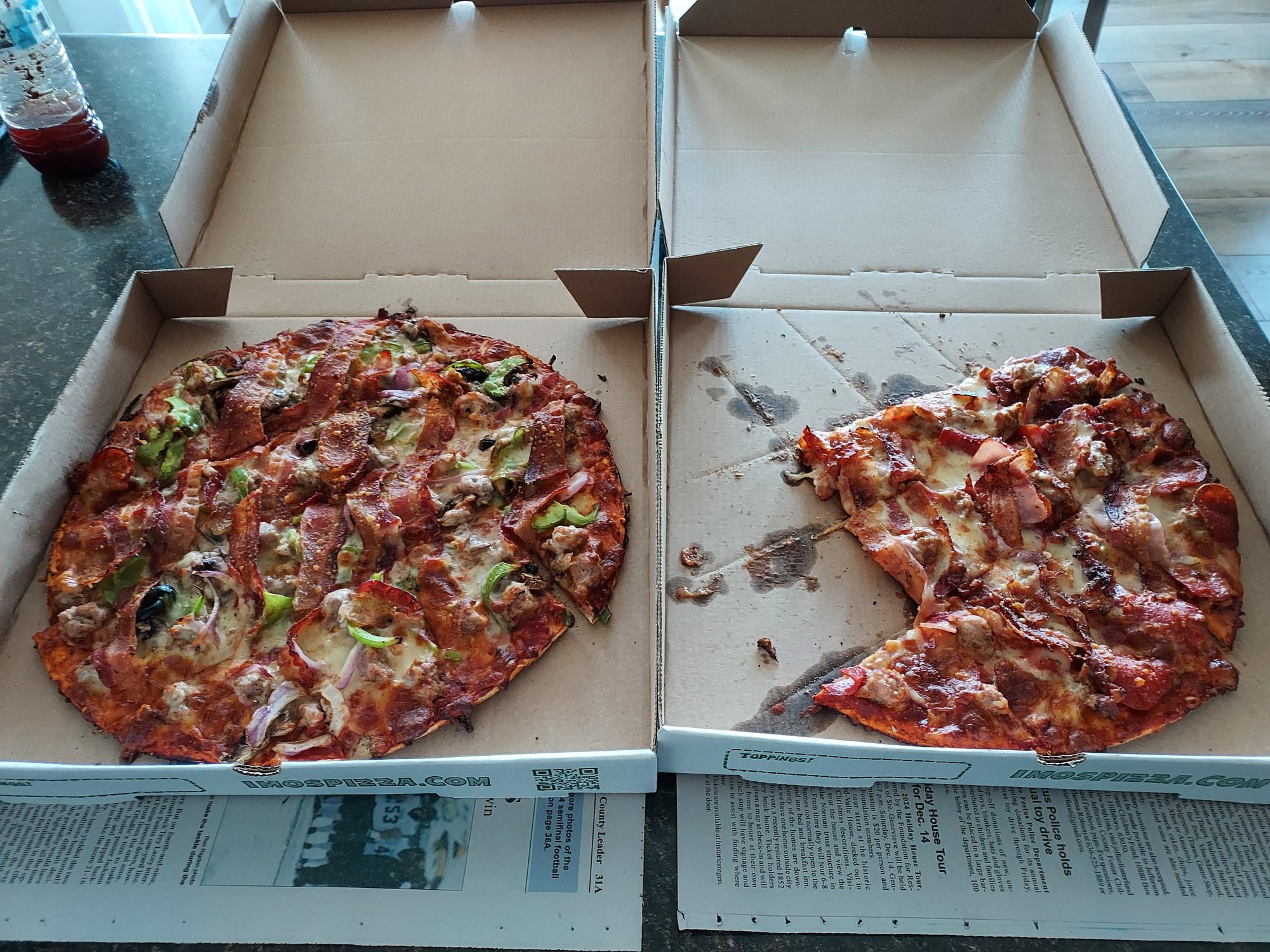 I had a craving for take-out pizza tonight, and the wife and l agreed on St. Louis's original thin crust Imo's pizza.   Meat lovers for her on the right (14