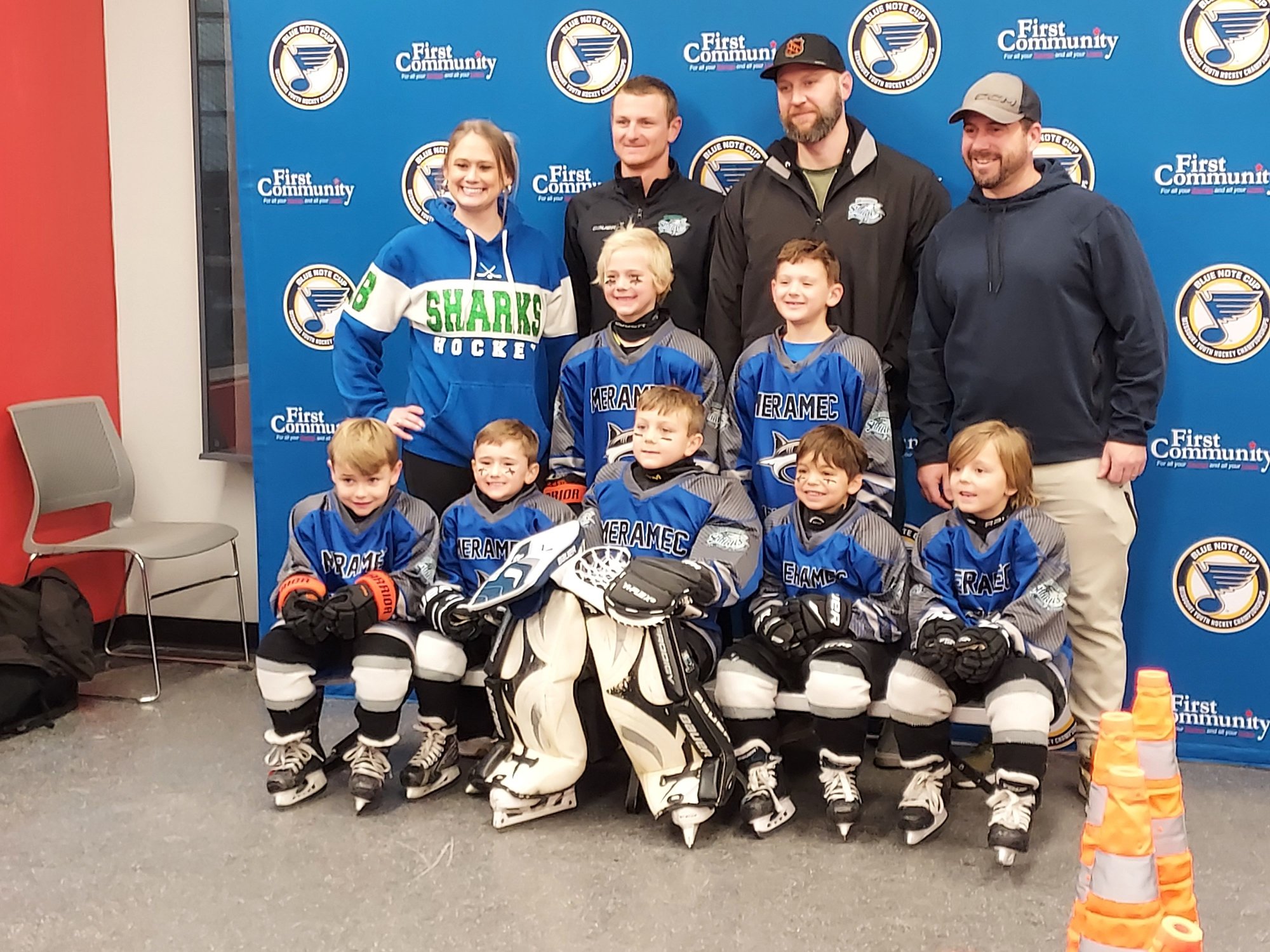 Team photo before the game.  Keegan is obviously in his hockey gear.  His Dad Justin is inmthe back row, 2nd from the left.