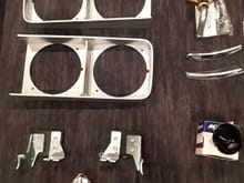 69 CUTLASS HEADLIGHT BEZELS $70, 442 REAR TAILPIPE HANGERS NEW $35, REAR SIDE MARKER USED $20,THERMOSTAT HOUSING WITH STAINLESS BOLTS(AFTERMARKET) NEW$10, VALVE COVER BREATHER  AC DELCO $15, REAR HOOD TRIM SOLD