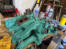 ...the intake manifold with a fresh coat of "low compression 394 green".