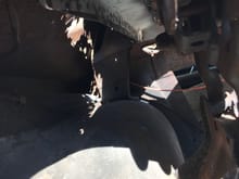 I was able to jam my spot welder from inside the trunk after I took off the handle