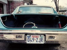 1990.  Different bumper installed at this point.