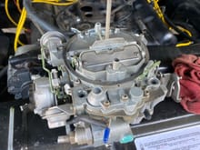 Incorrect carb from a 1980s era GM truck removed