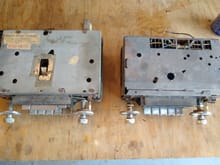 AM radio on the right (smaller one). Has the hole in the top for the lighting. FM on the left (note the strange slot in the top).