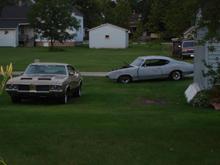 My back yard. There is another Cutlass behind the grey one.