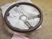 Subcompact Starfire wheel covered in brown leather