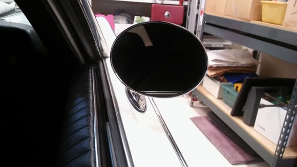Here's a couple of shots of a Fusick repro passenger side mirror installed.  Note they only were available in the standard side mirror. The remote driver side mirror does not have a matching mate.