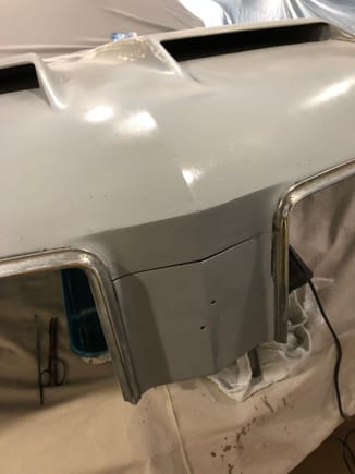 Went ahead and shot it with a DupliColor sandable high build primer in a rattle can. Sanded most of it off and filled holes and low areas with putty