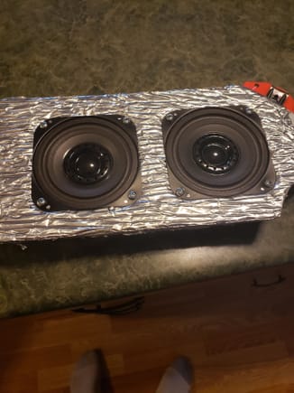 Made a homemade speaker housing for my dash speaker from an aluminum sign.  Wrapped it in insulation hopeing to reduce vibration.  Not sure if it will work.