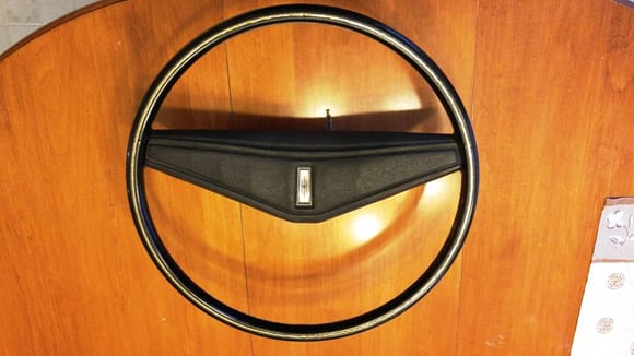 1972 Steering Wheel c/w pad. 2 small cracks in wheel shown in following pics