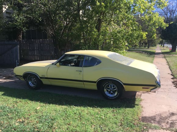 It takes a good picture. Roof has about five to six ripple dents. Pretty major dents. Rust around back glass. Non original wheels.