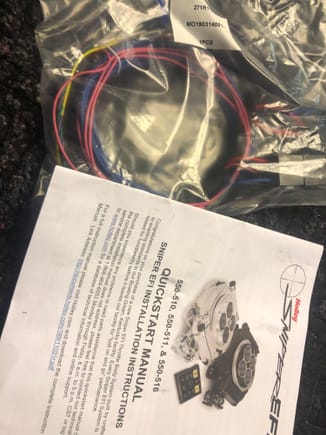 Unopened main harness with owners manual
