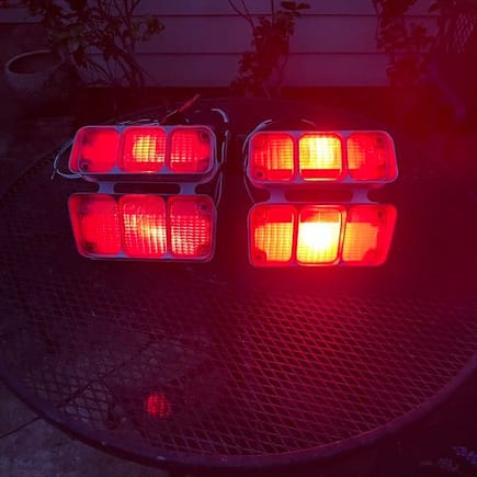 The standard, incandescent bulbs are on the left, LED on the right.  This is the tail light "lo" setting.  LED is definitely brighter and more intense.