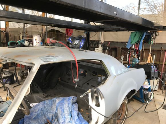 work area, also showing where the body was repaired. The area over the rear tire needs some work where the body shop screwed it up!