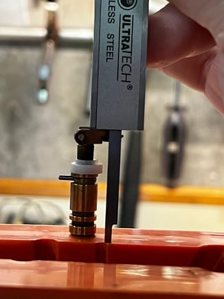 Use the depth gauge feature on your caliper to measure the height of your qjet primary rod arms - get 'em equal for consistent side to side fuel metering.