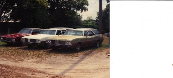 Two more of my 1971 Vista Cruisers with the restored '71 Cutlass. Everyone was very impressed with my car collection and wondered where and how did I find all these rare cars. At the time these pics were taken, the gold '70 was still in tact.