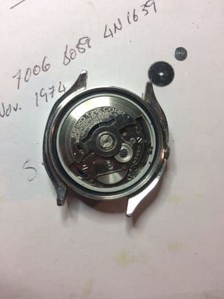 The wheel that broke and the screw head are above, and the spot where it broke is in the lower right hand corner of the movement.