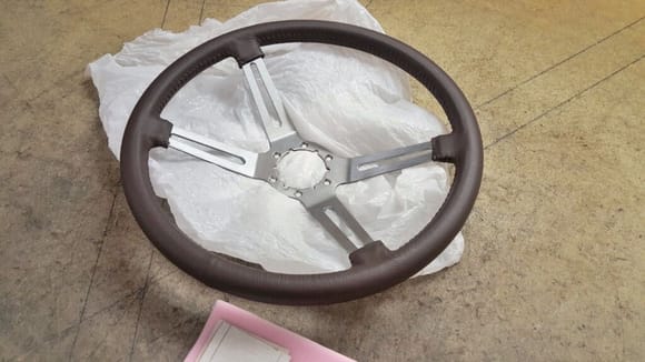 Subcompact Starfire wheel covered in brown leather