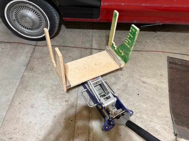 Drilled and tapped the jack base and mounted the fixture to it.