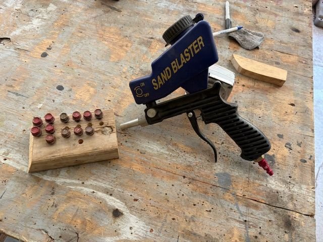 These little cheap spot blasters work great to cleanup small parts, but do it outside, with SAFETY.  Eye protection and an 95particulate mask, minimum
